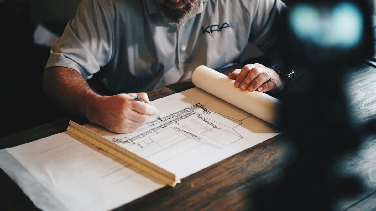 Designer working on construction drawings