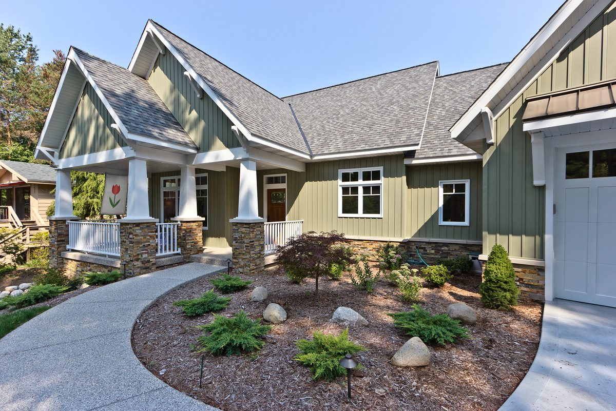 Craftsman home with stone porch piers. Home designed by Brian Eicholtz.